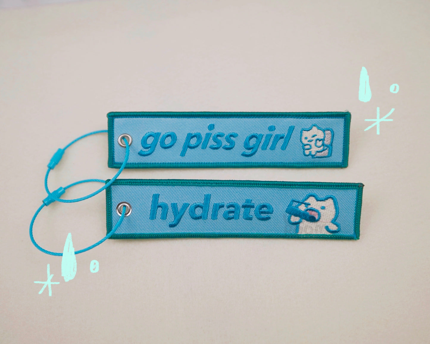 go piss girl keychain